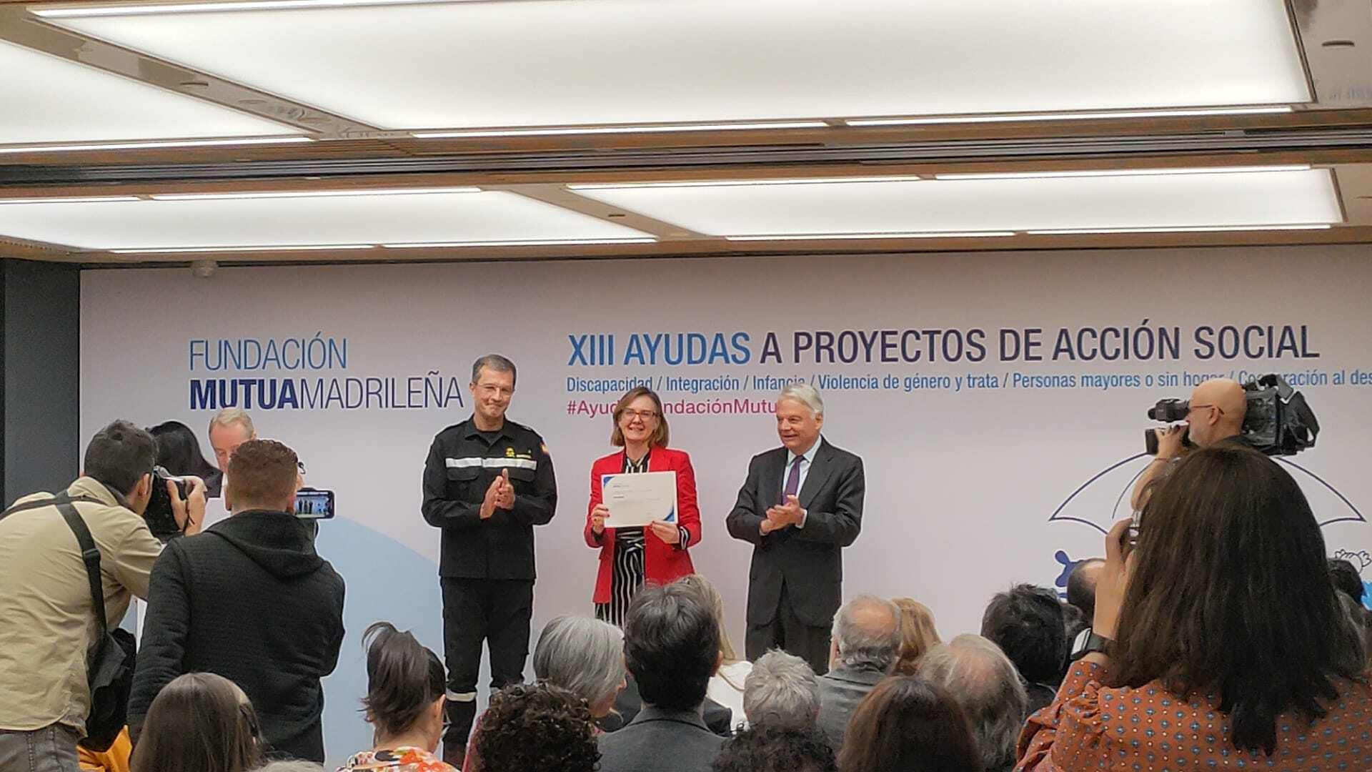 recibiendo el reconocimiento
